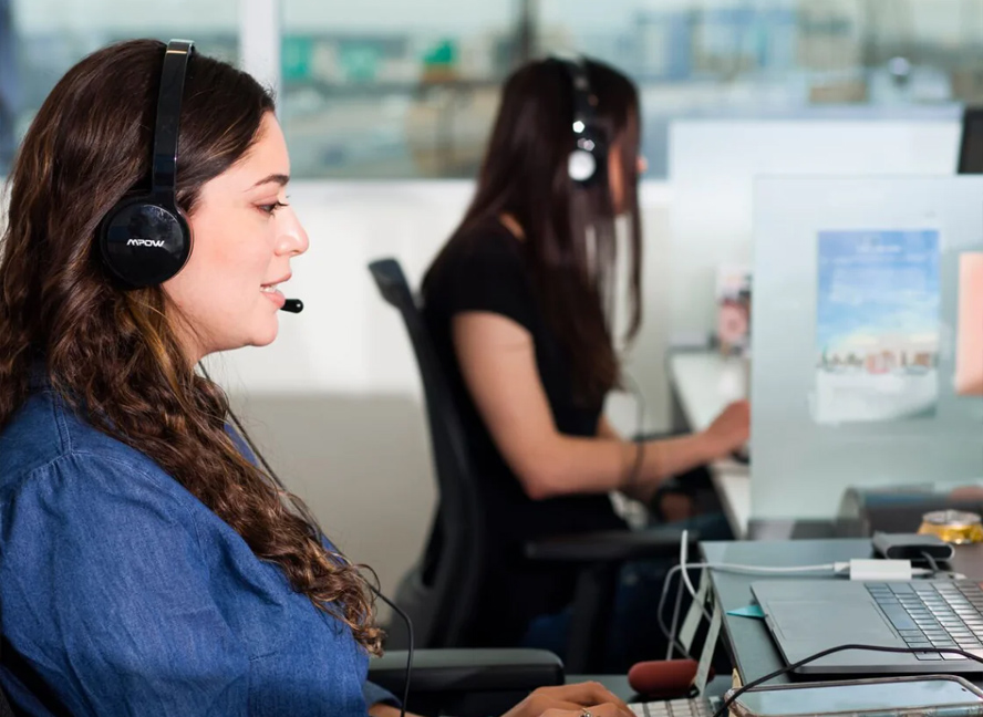 Women at a phone providing support