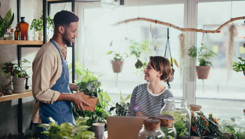 Two people working in a plant shop